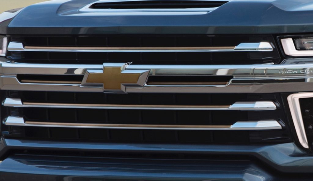 The Chevy logo on the grille of a 2020 Chevy Silverado HD.