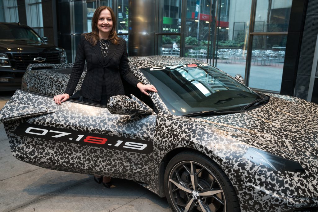 Mary Barra with mid-engine C8 Corvette