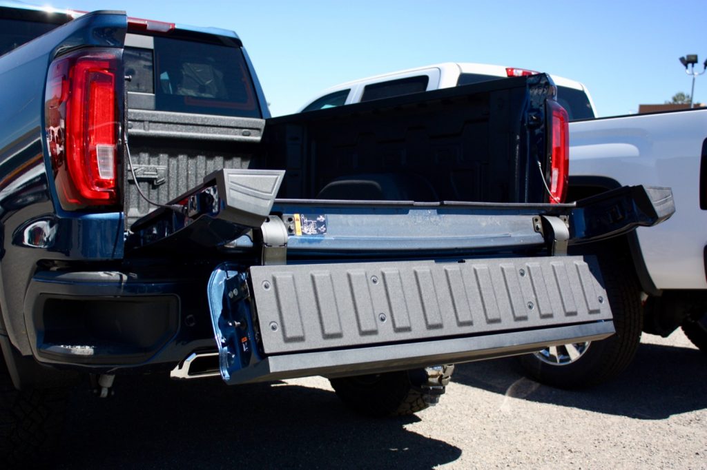 When dropped, the Multi-Flex tailgate's mid-gate hits the ball hitch (GMC Sierra's MultiPro shown here)