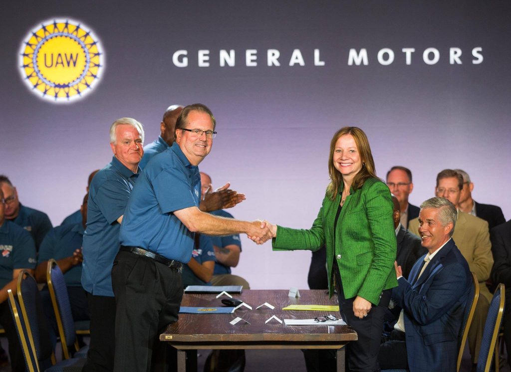 Former UAW President Gary Jones (left) with GM CEO Mary Barra (right