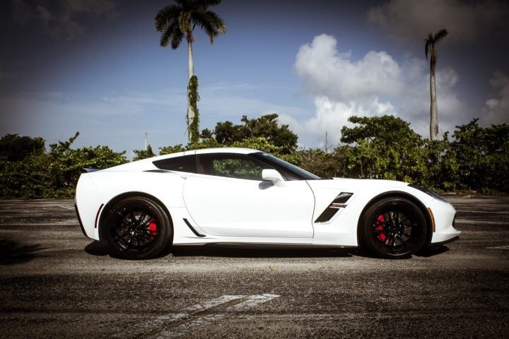 Black C7 Corvette wheels matched with white body panels.