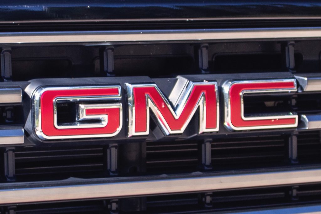 The GMC badge on a GMC Sierra HD grille.