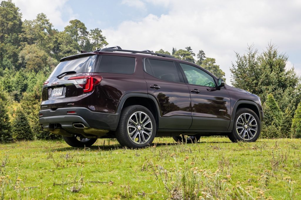 Side rear three quarters view of the GMC Acadia.