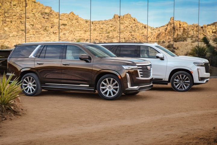 2021 Cadillac Escalade Sport and Platinum passenger side profile.
