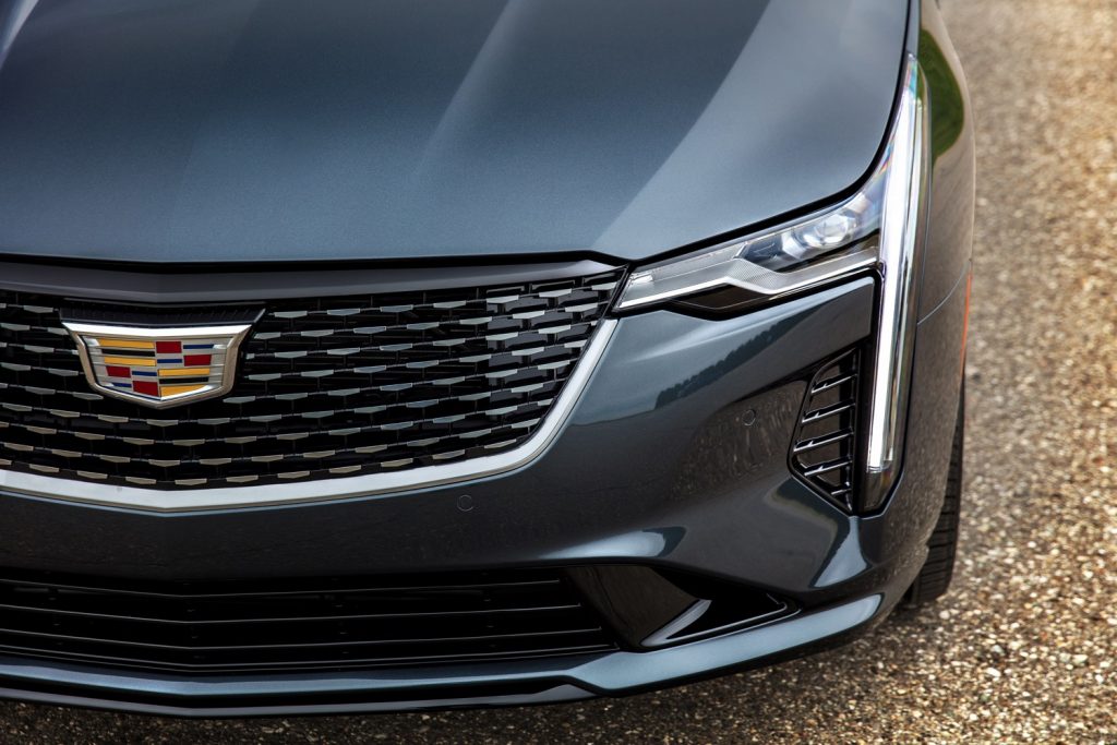 The front end of the Cadillac CT4 luxury sedan.