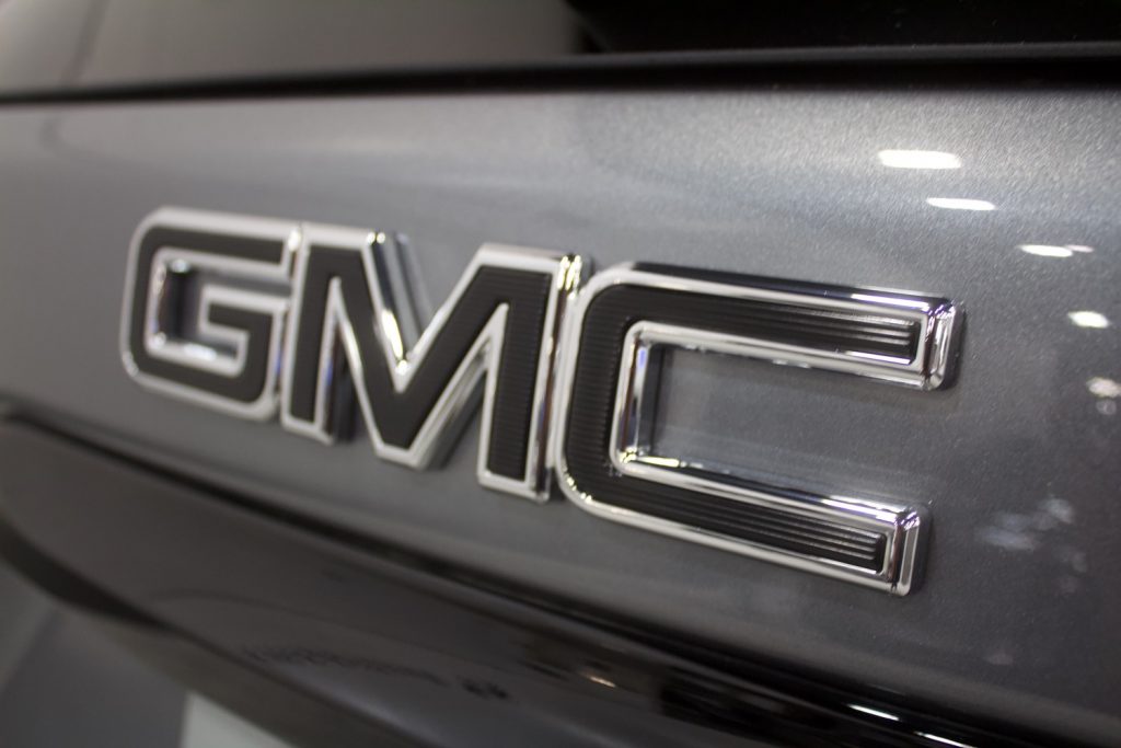 Black GMC logos are not part of the 2021 Acadia Elevation Package, but are offered as an option.