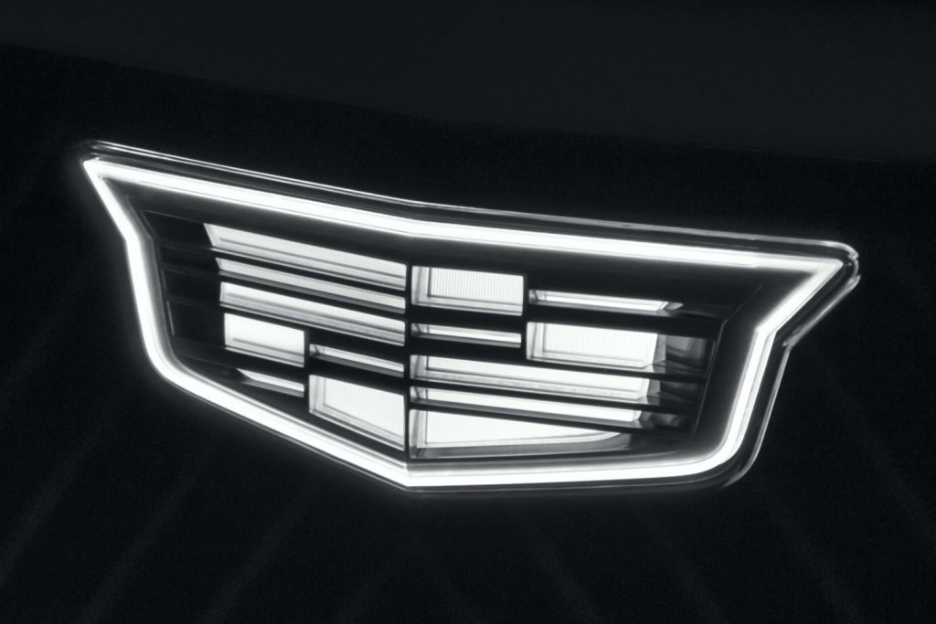 The illuminated Cadillac logo on the Lyriq grille.