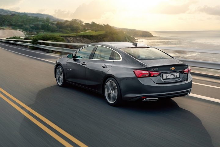 The Chevy Malibu drives off into the sunset.