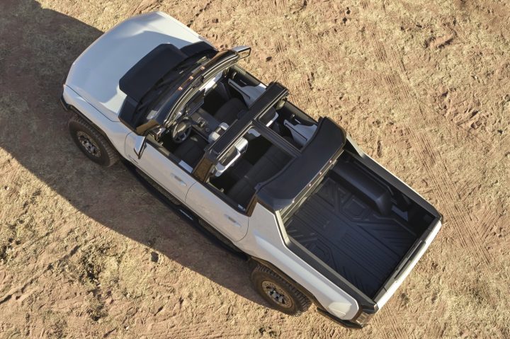 GMC Hummer EV Pickup with roof panels removed.