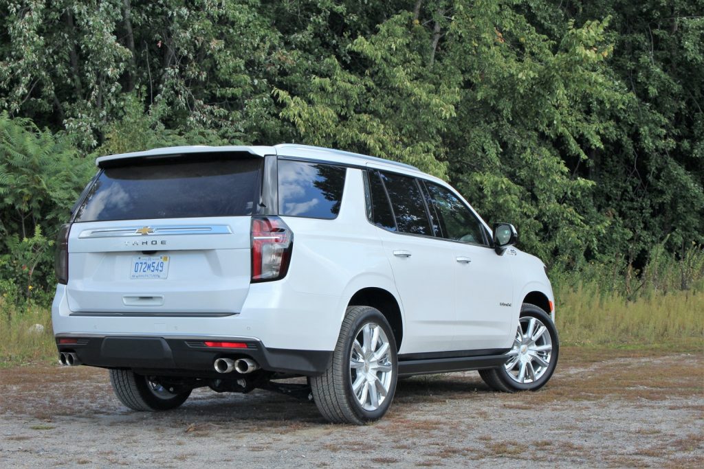 Rear three quarters view of the 2021 Chevy Tahoe, representative of fifth-gen Tahoe design.