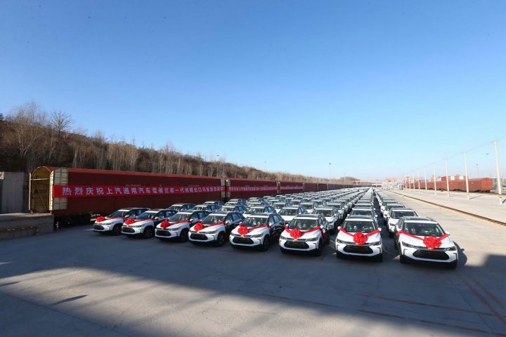 View of Chevy Tracker units ready for export at a train station in China.