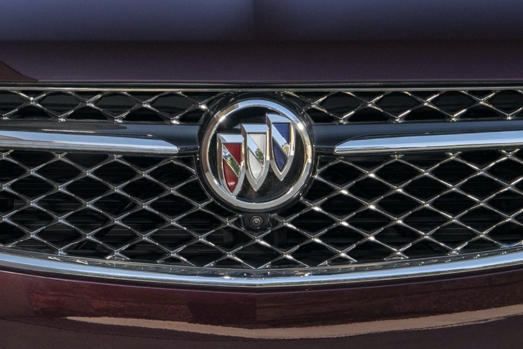 The Buick logo on a Buick Envision grille.
