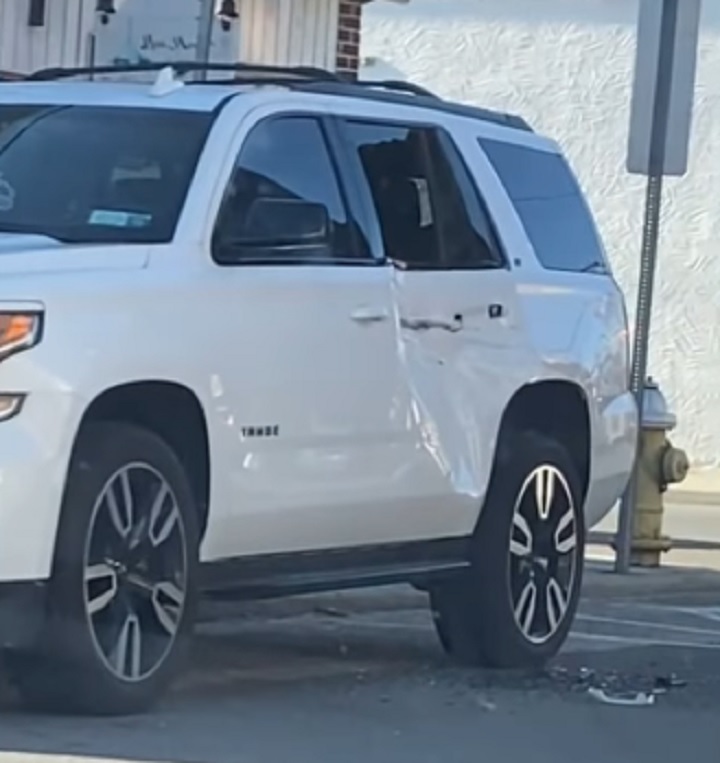 Chevy Tahoe Left Badly Damaged After Semi Truck Backs Into It: Video