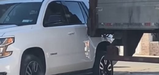 Chevy Tahoe Left Badly Damaged After Semi Truck Backs Into It: Video