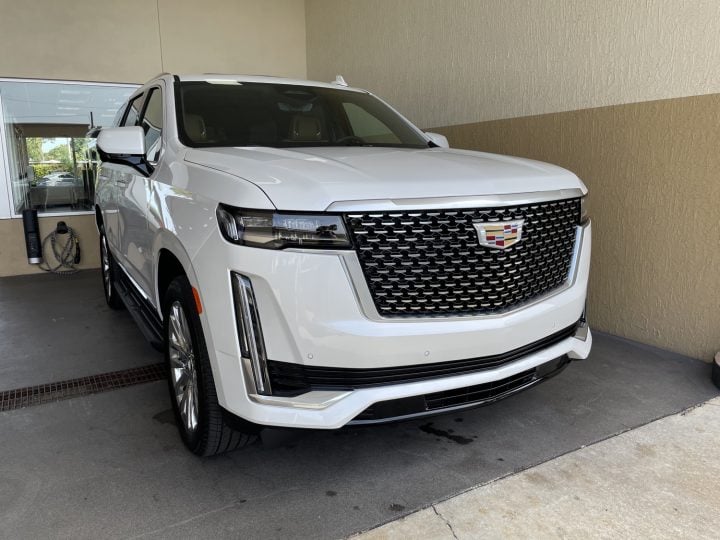 Front three quarters view of the 2021 Cadillac Escalade.