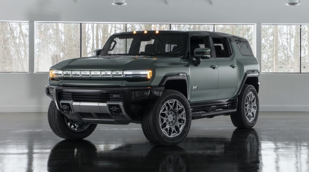 2024 GMC Hummer EV SUV in Moonshot Green Matte by GM, front three-quarters view. 