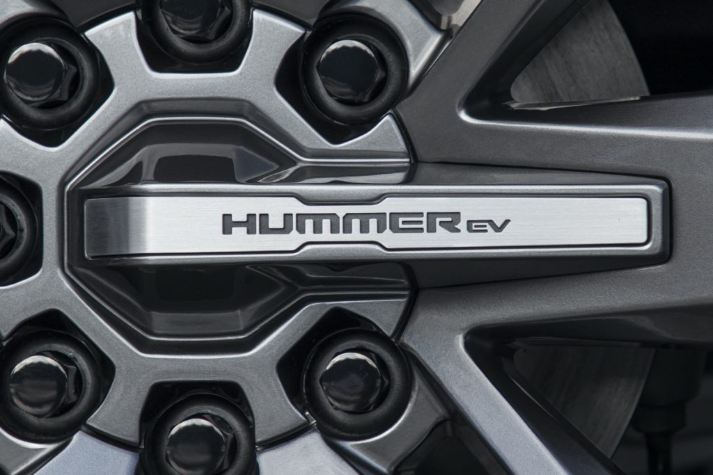 The Hummer logo on a wheel. 