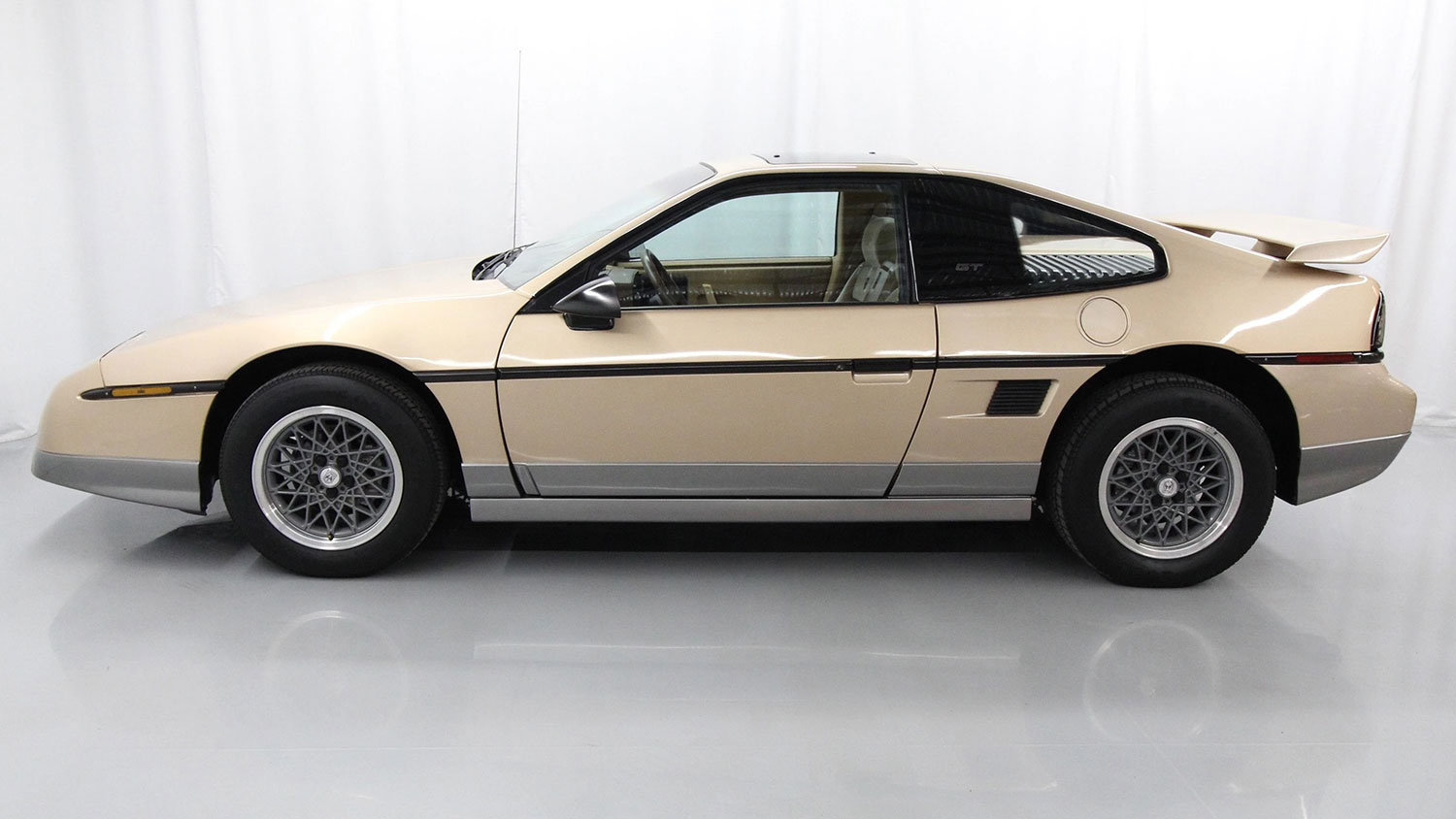 GM's original mid-engine sports car, much-improved, V6-powered Fiero GT