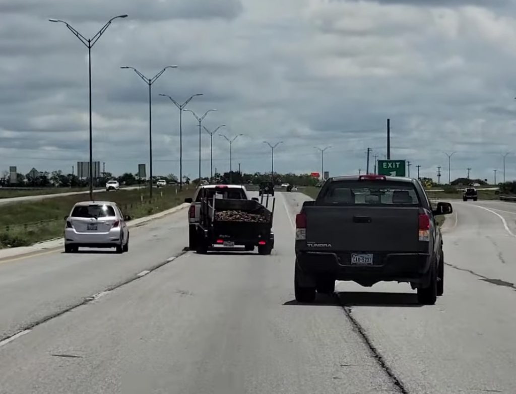 Chevy Silverado Careens Into A Ditch After Trailer Snakes