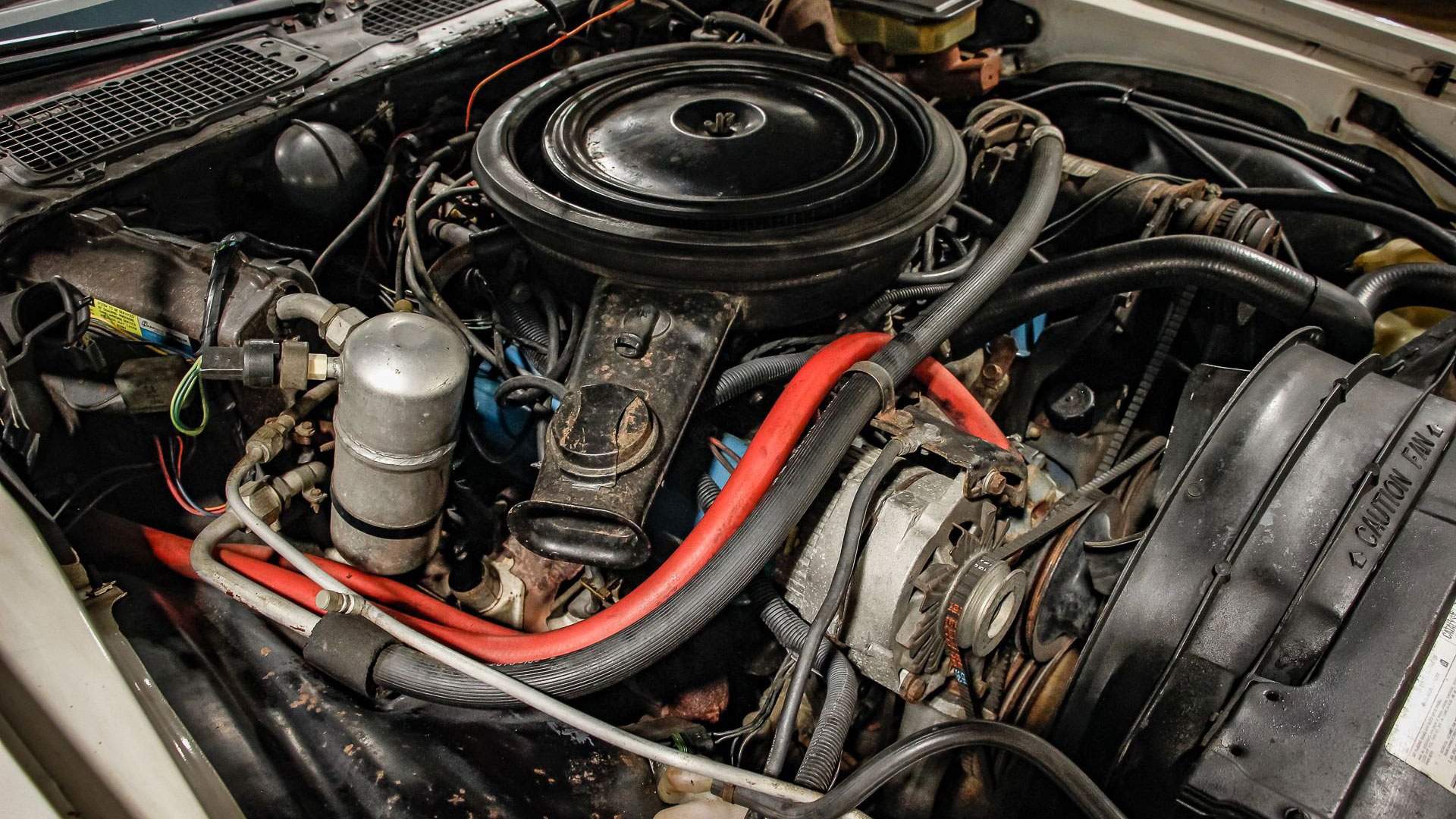 1981 Chevrolet Camaro convertible engine 001 Garage Kept Motors white passenger side engine bay GM Authority
