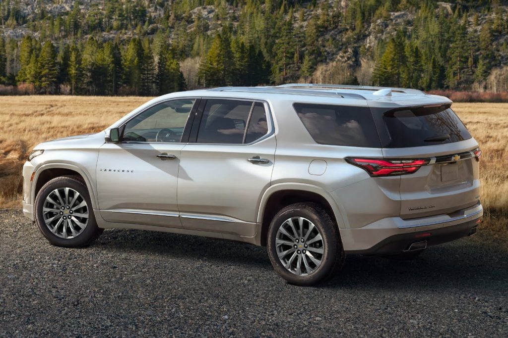 Side rear three quarters view of the 2022 Chevy Traverse.