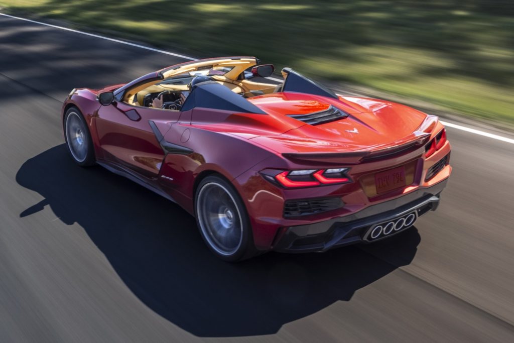 Rear three-quarters view of 2023 Corvette C8 Z06 Convertible in Red Mist Metallic Tintcoat.