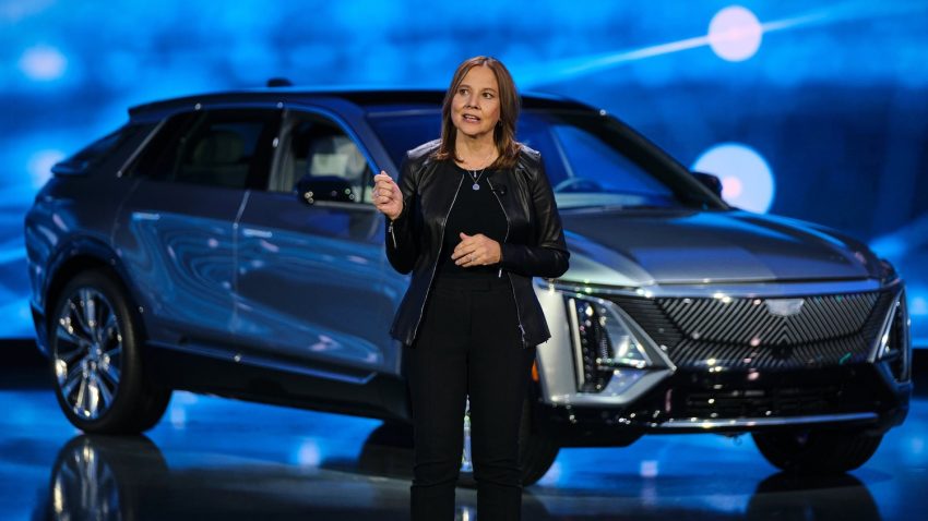 Mary Barra in front of a Cadillac Lyriq EV.