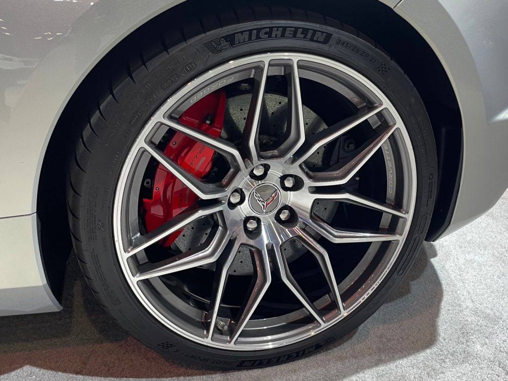 Red brake calipers on a 2023 Corvette C8 Z06 Coupe with 21-inch spider wheels.