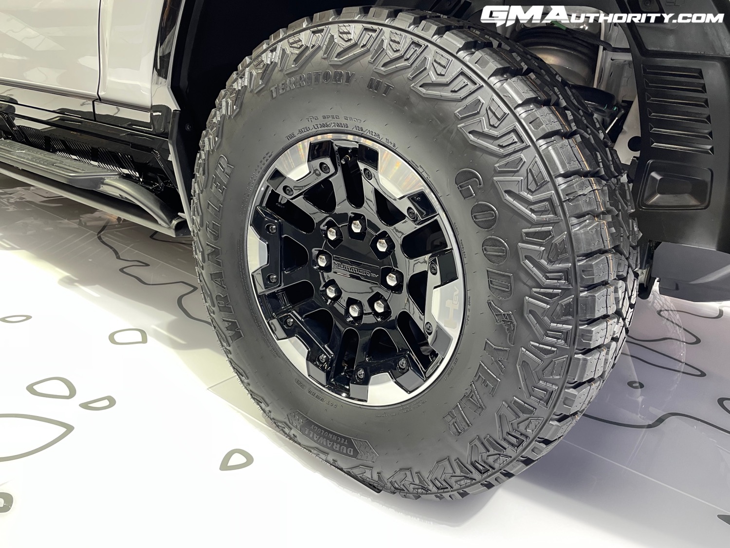 2022 GMC Hummer EV Pickup Edition 1 – SEMA 2021 Live Photos – Interstellar  White – Exterior 008 – front 18-inch Black Aluminum wheel with machined  accents RCS – Goodyear Wrangler Territory MT Tire | GM Authority