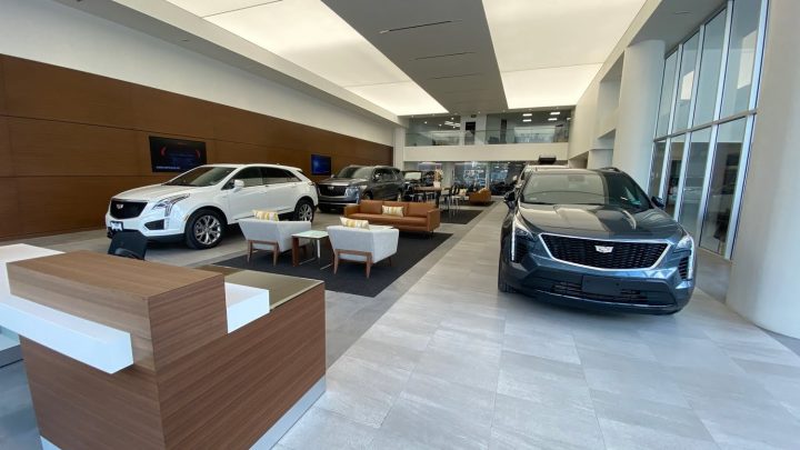 New cars in a Cadillac showroom.