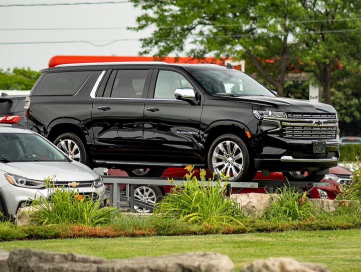 A new Chevy Suburban on sale at a dealer.