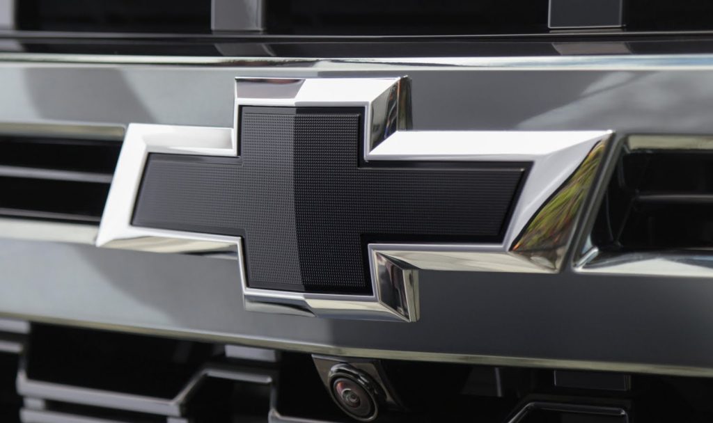 The Chevrolet bow tie on the Chevy Tahoe.