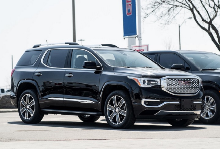 The GMC Acadia on the lot at a GMC dealer.