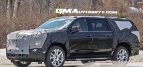 Spy Shots GM Authority   2024 Chevrolet Suburban Prototype Spy Shots May 2022 Exterior 003 Front Three Quarters Dual Level Headlight Setup 295x140 