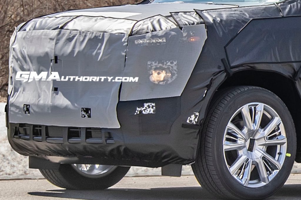 A front three quarters view of the front end of a 2025 Chevy Suburban prototype captured in May 2023.