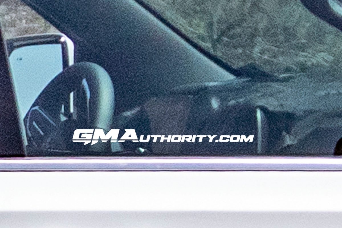 2024 Chevy Suburban What We Know And Expect   2024 Chevrolet Suburban Prototype Spy Shots May 2022 Interior 002 Cockpit Dash Steering Wheel Gauge Cluster 1200x800 