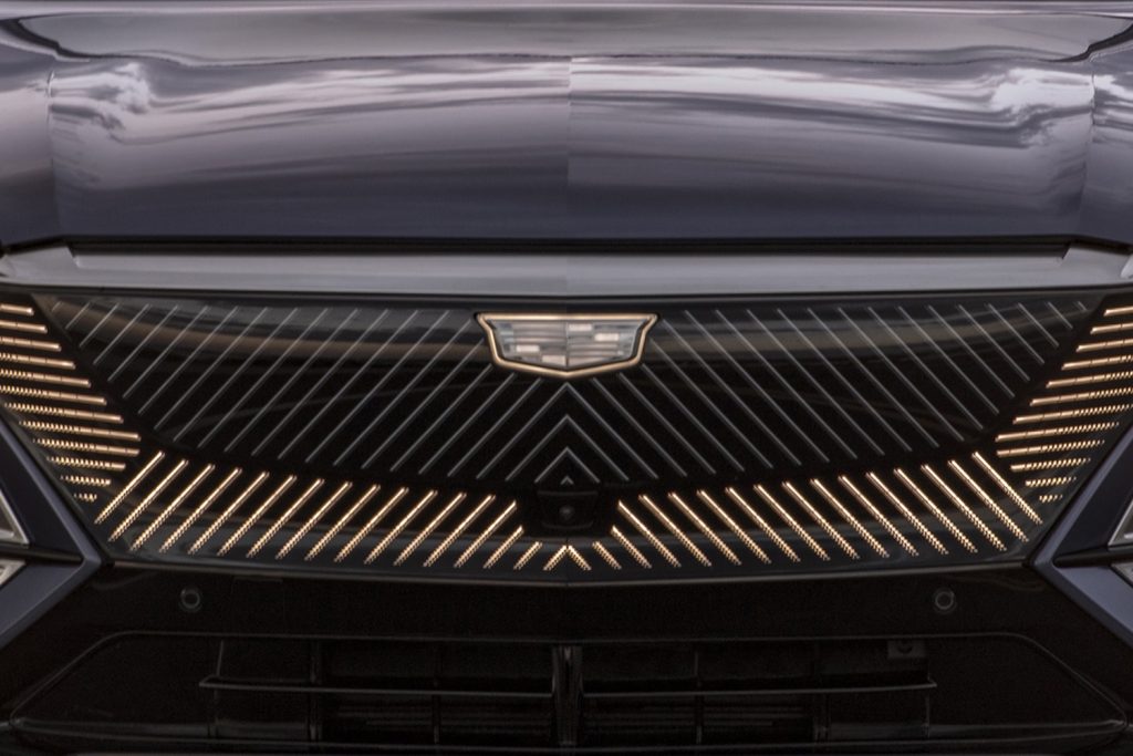 The grille of the 2023 Cadillac Lyriq with a monochrome Cadillac badge.