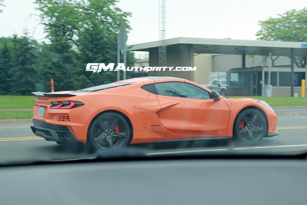 An international-market 2023 Corvette Z06 in Amplify Orange Metallic with body-colored accents.