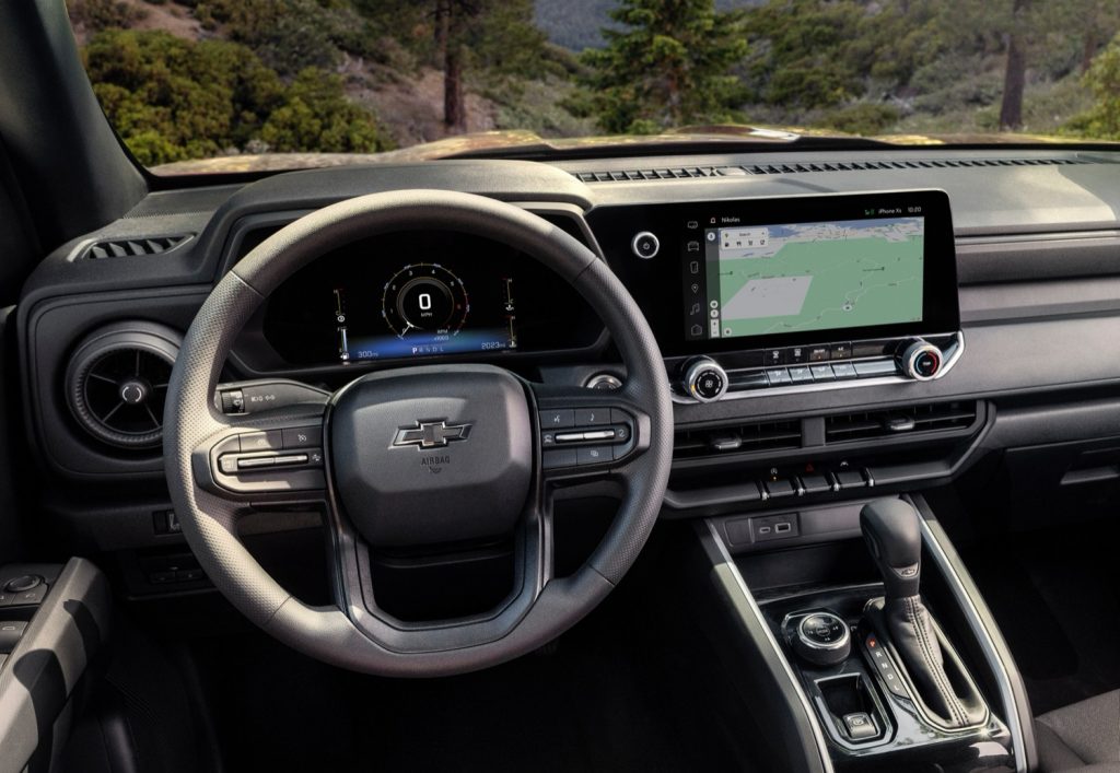 An interior photo of the 2023 Chevy Colorado Trail Boss with the 8-inch digital gauge cluster.