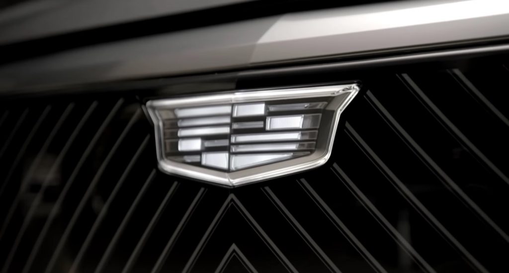 Detail of the monochrome Cadillac logo on the 2023 Cadillac Lyriq.