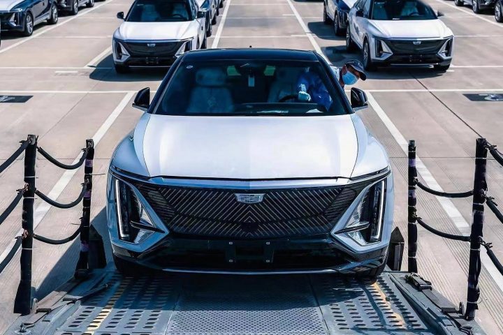 A photo of the Cadillac Lyriq being loaded onto a transport truck.