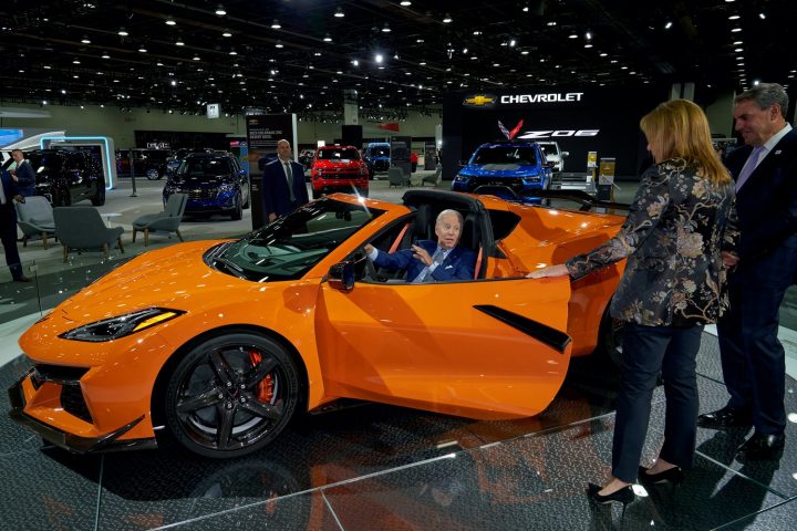 GM CEO Mary Barra and GM President Mark Reuss showing Joe Biden a Corvette Z06.