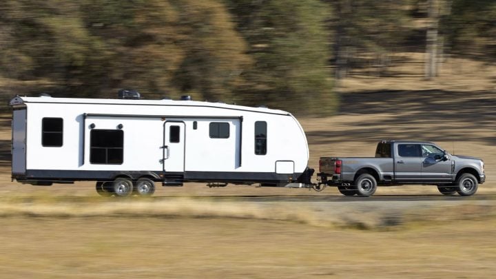 Ford Super Duty towing a camper.