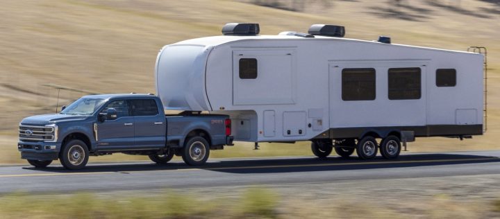 Ford Super Duty Limited towing a trailer.