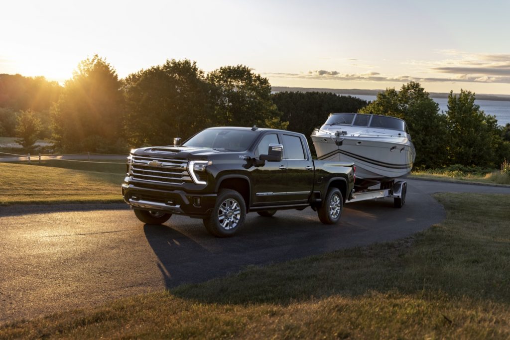 Side front three quarters view of the 2024 Chevy Silverado towing.