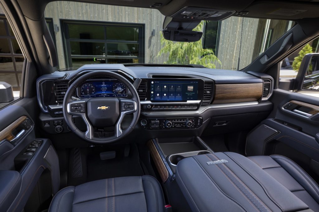 Cockpit of 2024 Chevy Silverado HD with infotainment screen and displays.