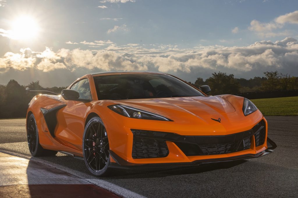 A front three quarters view of the 2023 Chevy Corvette Z06 in Amplify Orange Tintcoat.