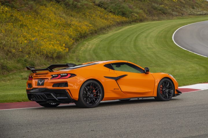 The side view of the 2023 Corvette Z06 on a race track.