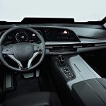 The Rezvani Vengeance's interior shows its Cadillac Escalade origins.