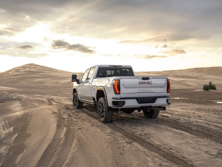 Rear-three-quarter view of 2024 GMC Sierra HD.